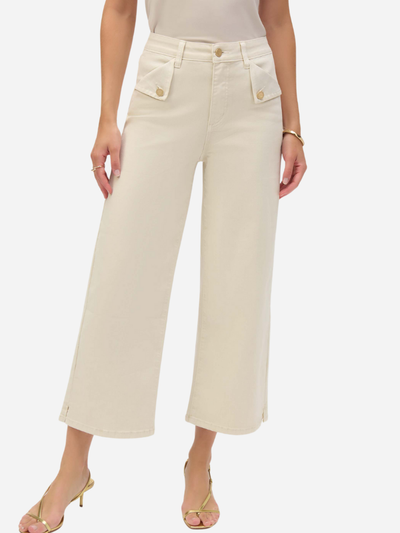 woman in Stretch Culotte cream colored Jeans with Raw-Edge Hem