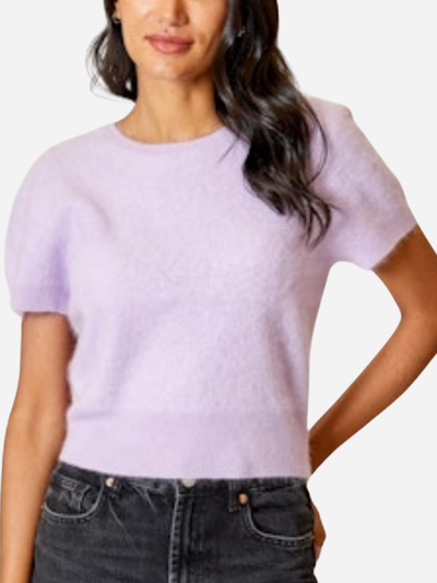woman in lavender short sleeve cashmere sweater