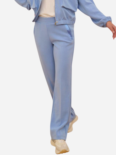 Woman in light blue leisurewear pants