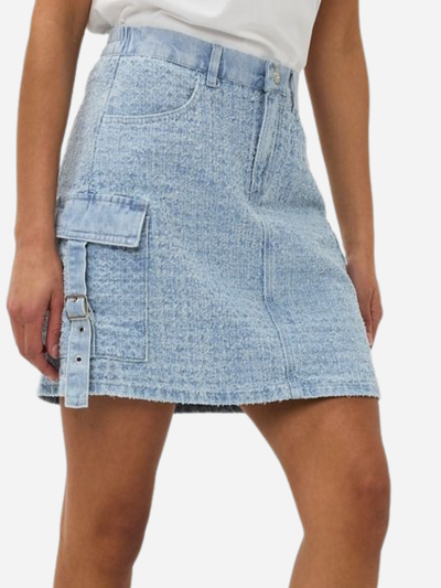 woman in mini denim skirt with cargo pockets