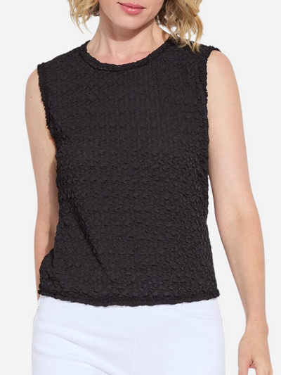 Woman in sleeveless textured black top