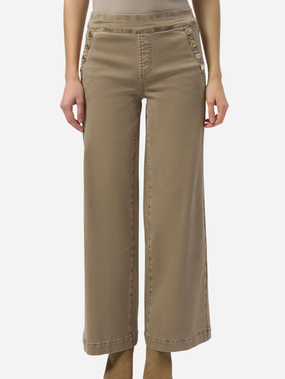 Beige wide-leg pants worn by a woman on a white background