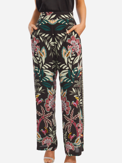 woman in black pants with floral print