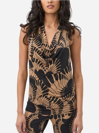 Woman wearing a sleeveless dress with black and beige abstract pattern on a white background