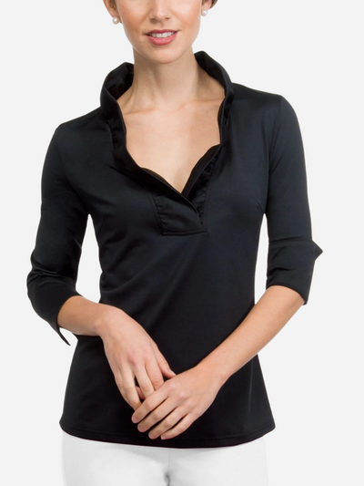 Woman wearing a black long-sleeve top on a white background