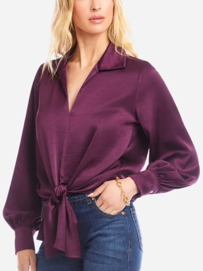 woman in purple front tie silky blouse