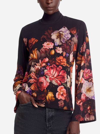 Floral patterned long-sleeve top worn by a model on a white background