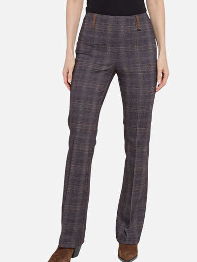 Plaid pants worn by a woman on a white background
