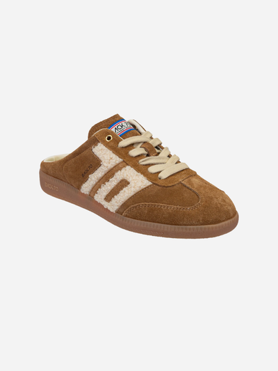 Brown sneaker with white logo on a light gray background