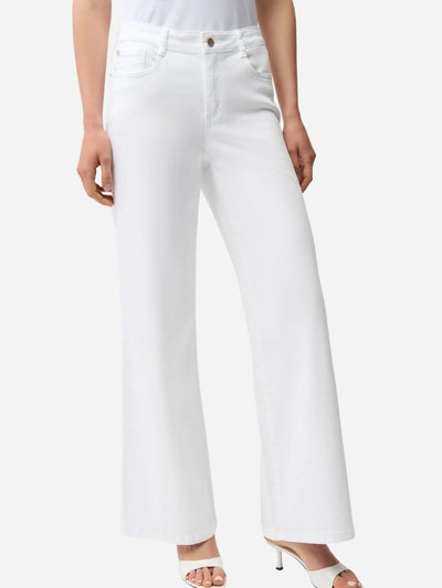 White jeans worn by a woman on a white background