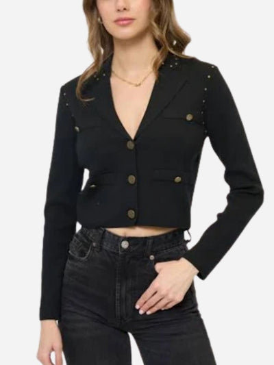 Black cropped blazer with gold buttons worn by a person on a white background