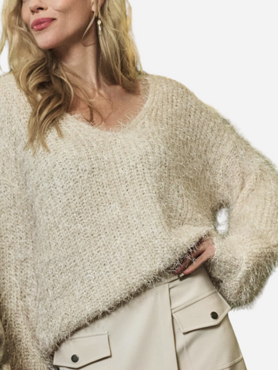 fuzzy women's cream sweater