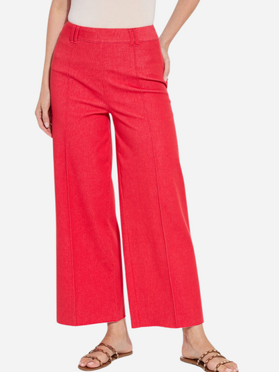 Woman in red wide leg pants