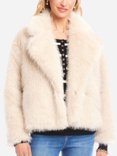 woman in cream faux fur cropped jacket