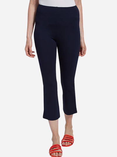 woman in blue cropped trousers