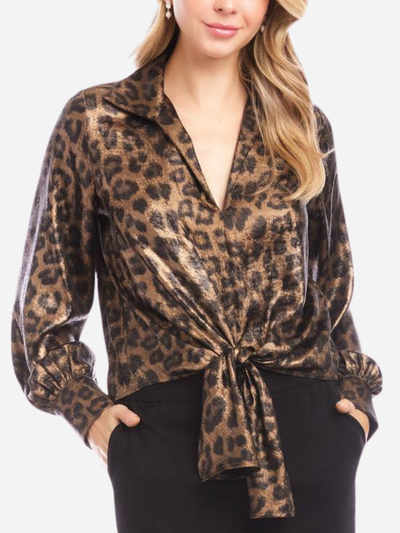 Woman wearing a leopard print blouse with a white background
