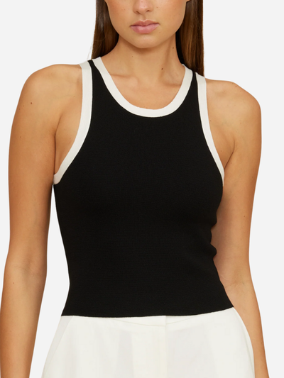 woman in black tank top with white trim