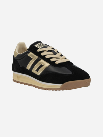 Black and gold sneaker on a white background