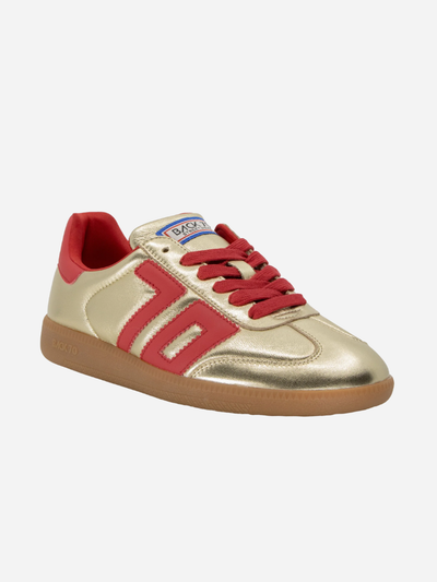 Gold and red sneaker for Chiefs games on a white background
