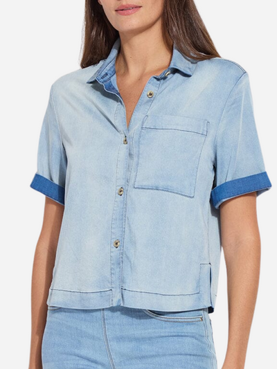 Woman in short sleeve denim button down