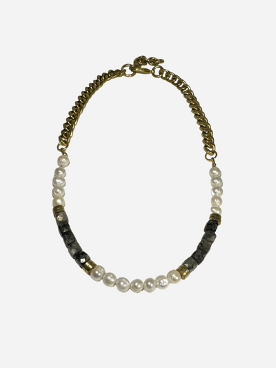 Bracelet with pearls and gold chain on a white background