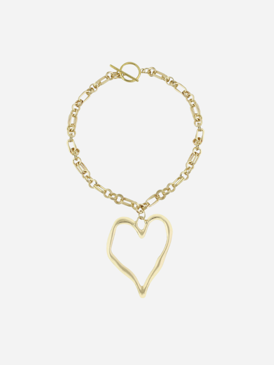 gold statement necklace with large gold heart